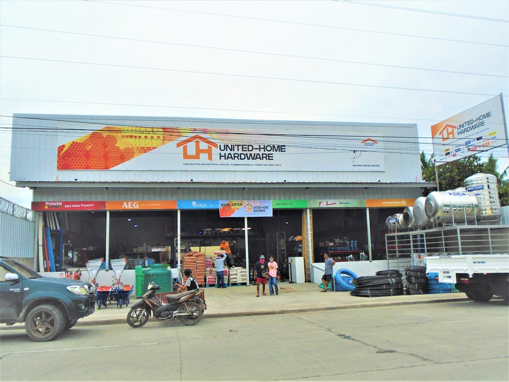 United-Home Hardware storefront and product displays, a JCG Summit Enterprises OPC business unit.